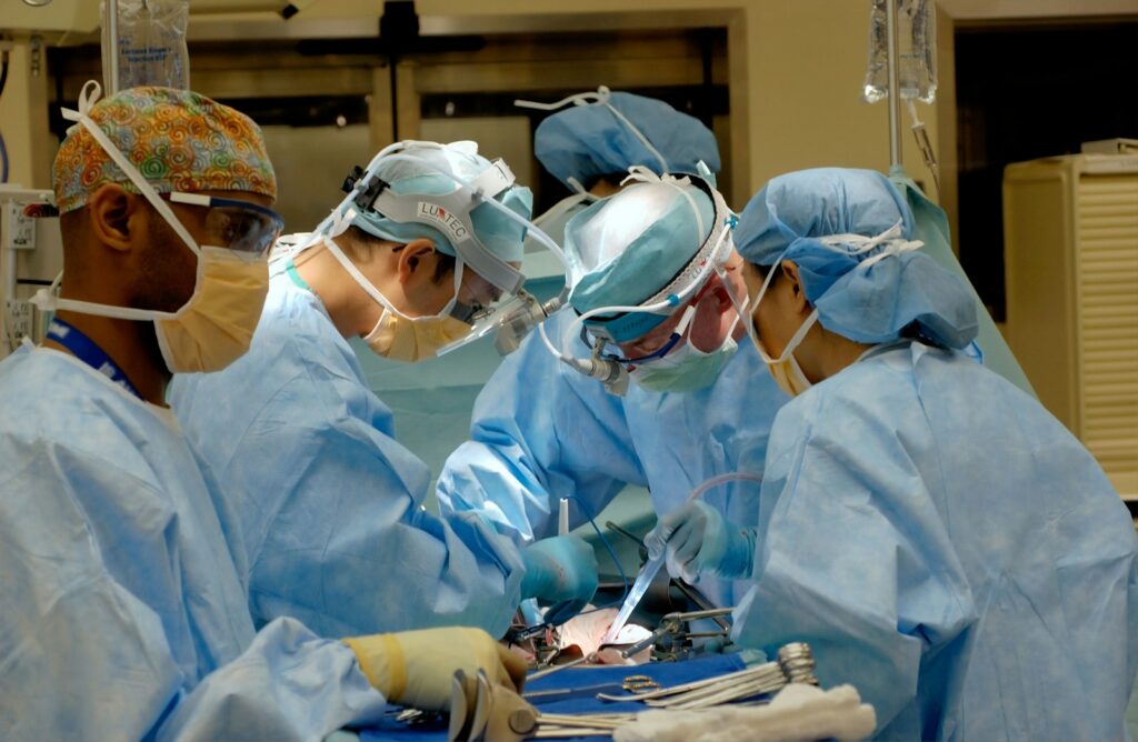 Surgical team performing a procedure in an operating room